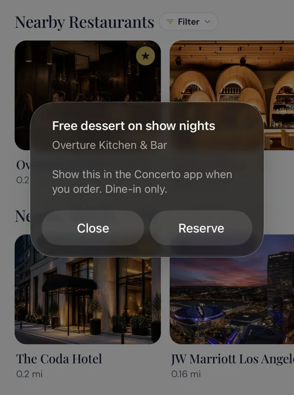The Perk fans see after tapping the gold star: free dessert on show nights, with Close and Reserve